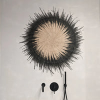 handwoven malawi sun circle in black at material26 berlin